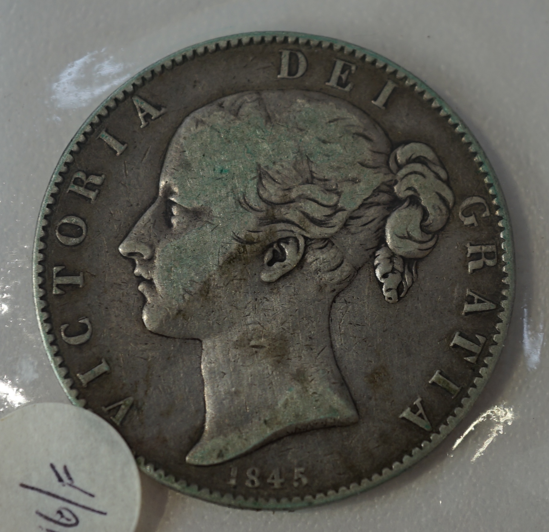 British silver coins, William IV to George VI, comprising five Victoria crowns, 1845, 1889, 1891, 1896 and 1900, a double florin, 1887 (brooch pin demounted), three George V crowns, 1935, George VI crown 1937, three half